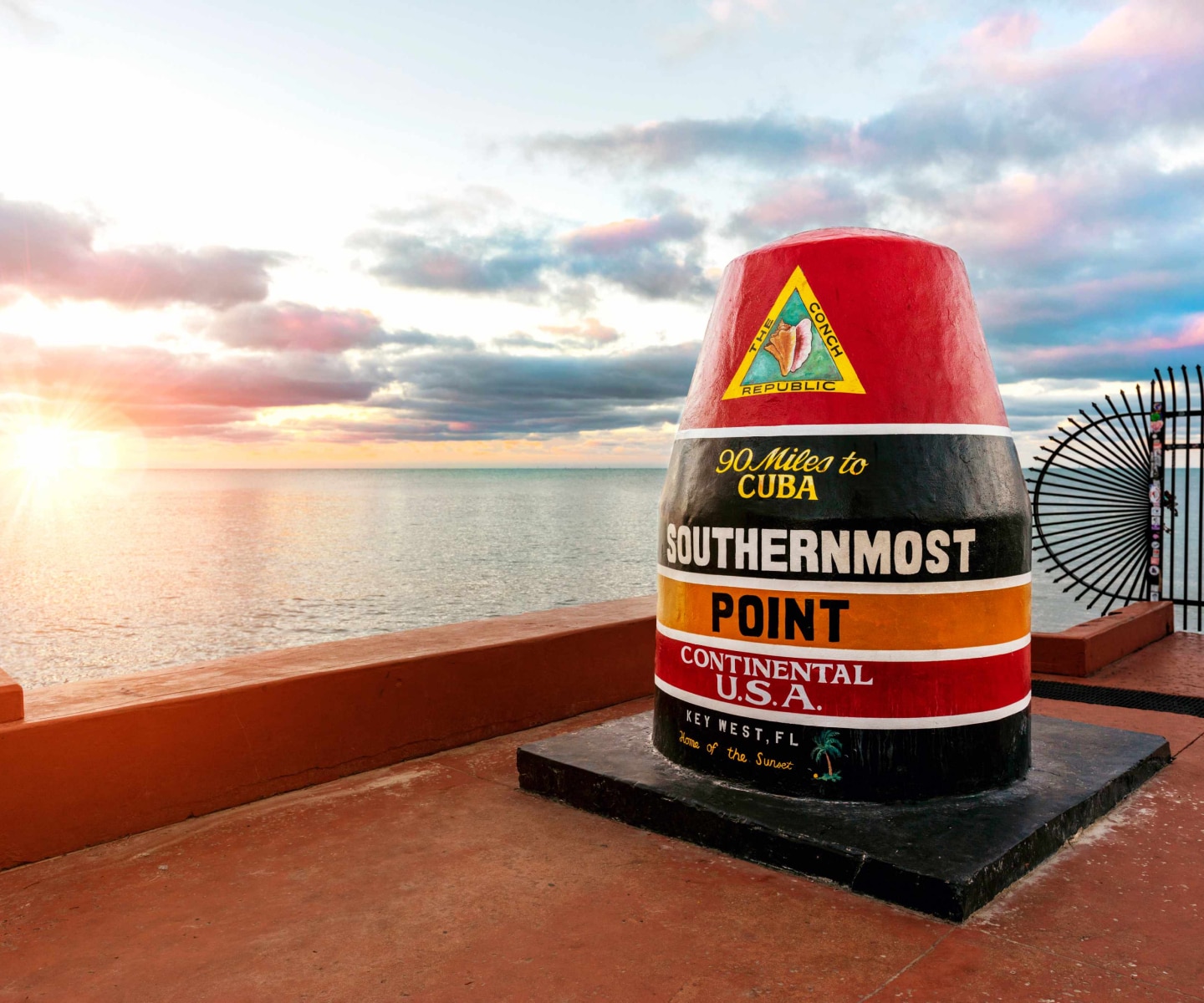 What the sunset from the southernmost point on a visit to Key West during your next cruse from or to Miami with MSC Cruises.