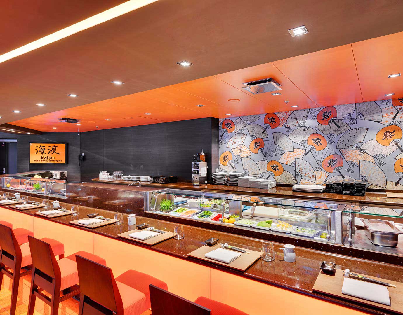 Elegant sushi bar with vibrant decor and fresh ingredients onboard | MSC Cruises