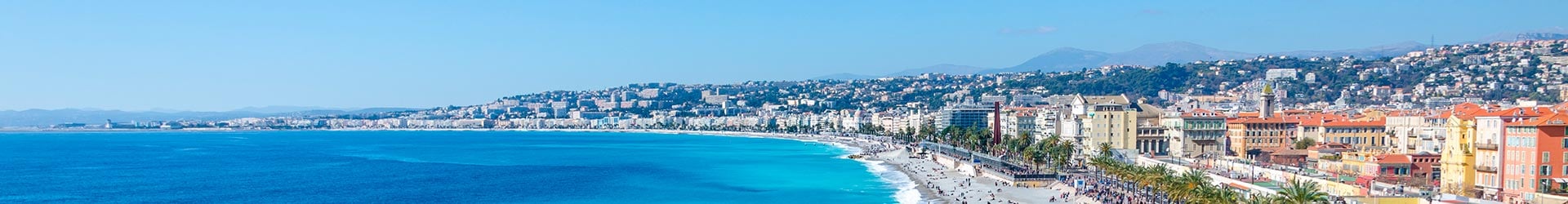 Panoramic view of Nice coastline with turquoise waters and vibrant cityscape | MSC Cruises