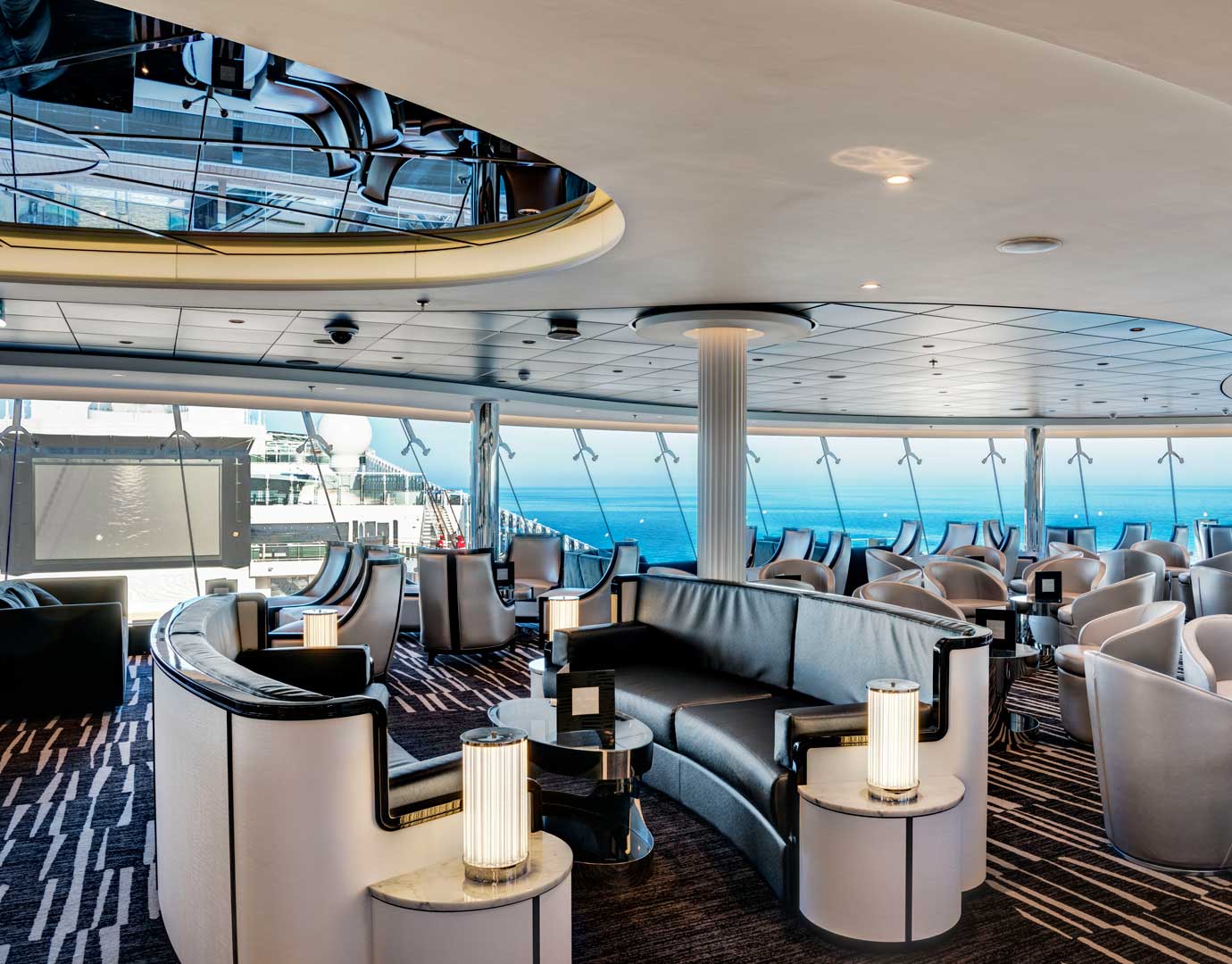 Luxurious lounge with ocean views and modern seating on an MSC cruise ship | MSC Cruises